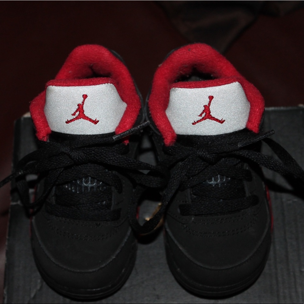 Black and red Jordan 5